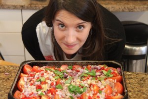 Alex inspecting the tomatoes before they go in the oven.
